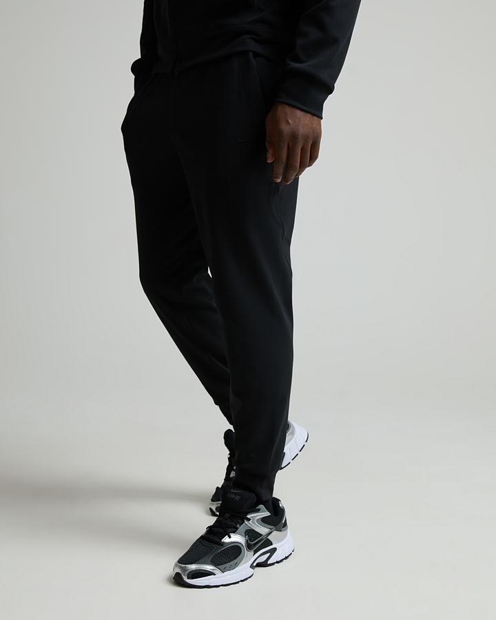 Nike Men's Primary NanoKnit Dri-FIT UV Protection Jogger - Black