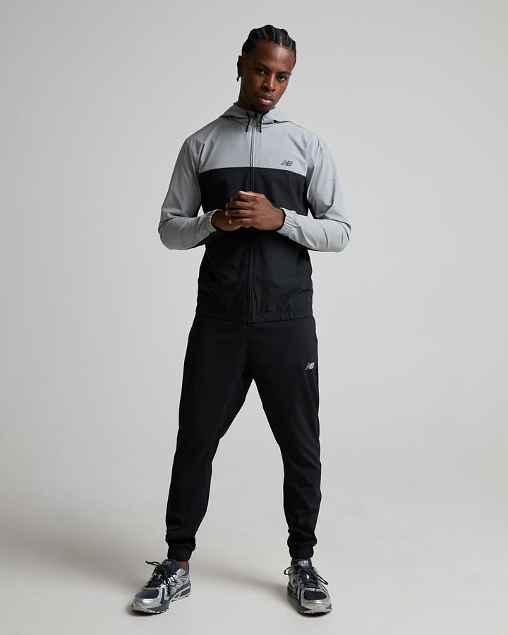 New Balance Men's Sports Essential Woven Hoodie - Black/Reflective