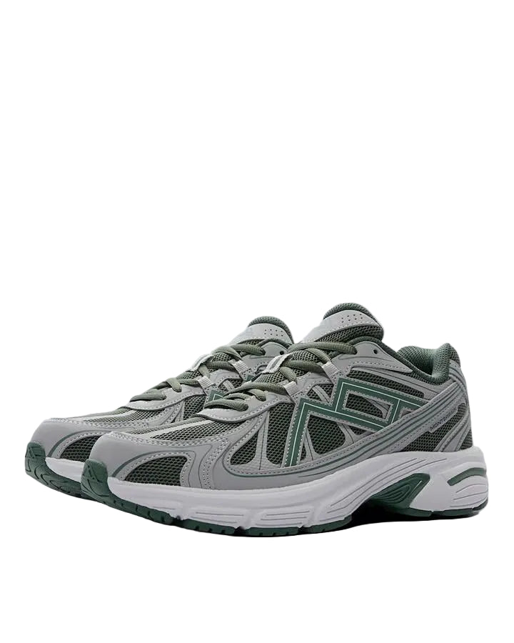 A pair of gray and green athletic sneakers with white soles, displayed against a solid light gray background.